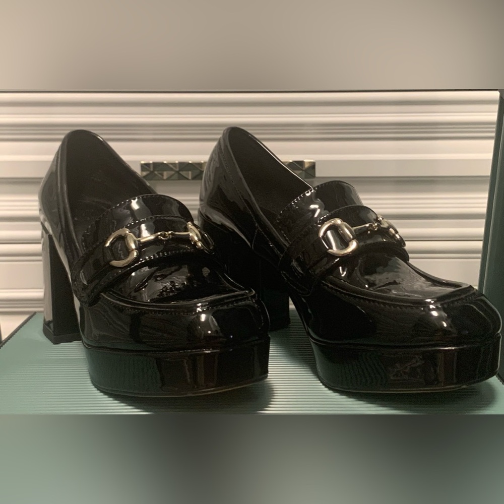 Black patent heeled platform shoe by H&M.  Size 37 (6.5).